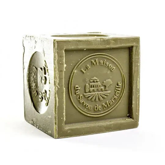 Cube-shaped soap with 'Le Maison du Savon de Marseille' logo on a white background