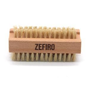 Wooden brush with bristles labeled 'Zefiro' on a white background