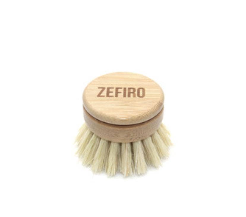 Dishwashing brush with wooden handle and bristle head on a white background, branded 'Zefiro'.