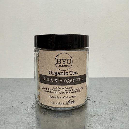 Jar of Julie's Ginger Tea with BYO Organic Tea label on a gray surface