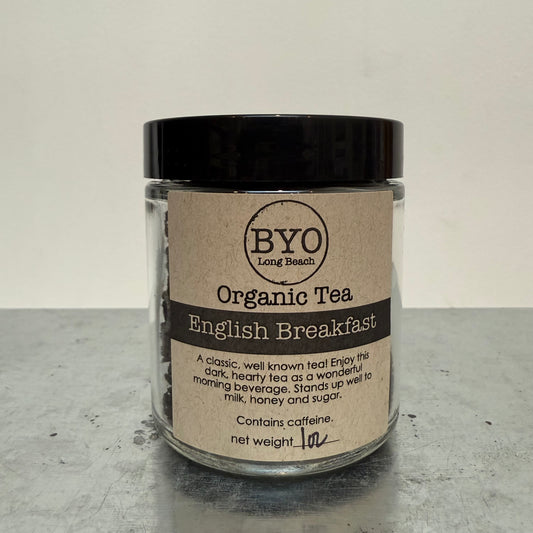 Jar of Organic Tea with 'BYO' label on a gray surface