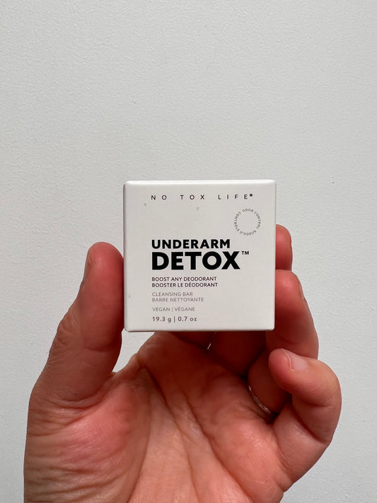 Small white box showing product. Reads: Underarm Detox