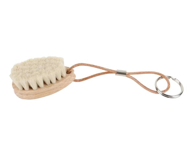 Small wood brush with natural bristles on a keychain.