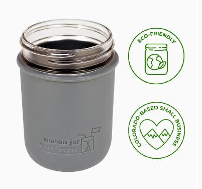 A gray silicone sleeve designed for a wide mouth pint jar, with eco-friendly symbols indicating the product is made from sustainable materials.