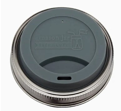 Silicone gray lid with metal band. Lid has small opening for sipping.