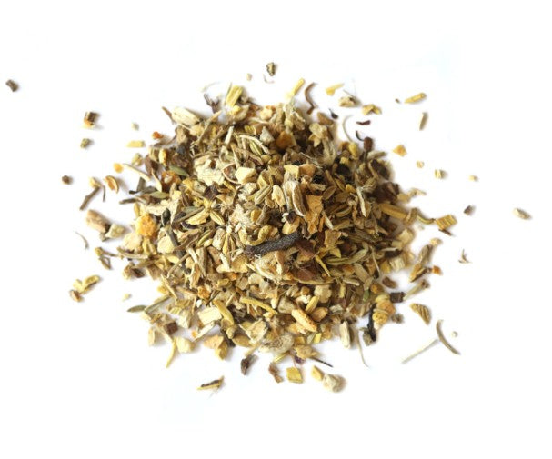 Heap of dried herbs on a white background