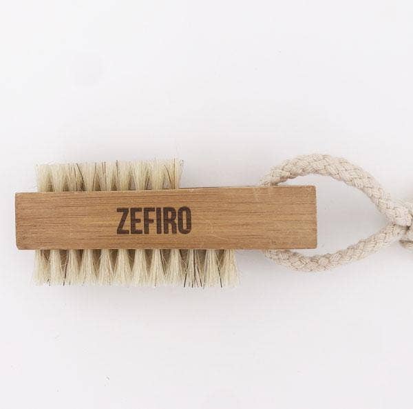 Branding brush with 'Zefiro' logo on a white background
