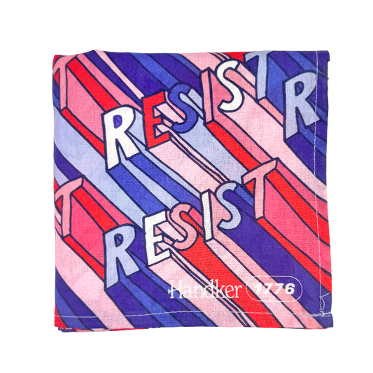 Handkerchief with 'RESIST' text in colorful geometric pattern on a white background
