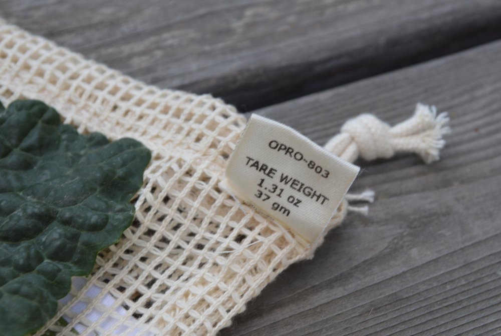 ECOBAGS® Organic Produce Bag close up showing tare weight printed on tag.