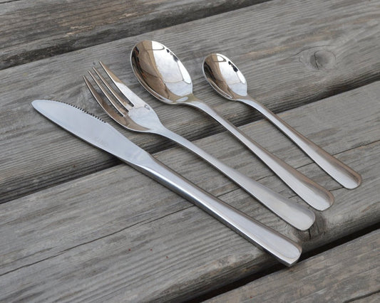 Set of 4 stainless steel utensils including a butter knife, fork, spoon, and coffee spoon 