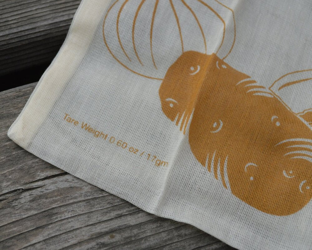 Close up of corner of bag showing the tare weight printed on the bag.