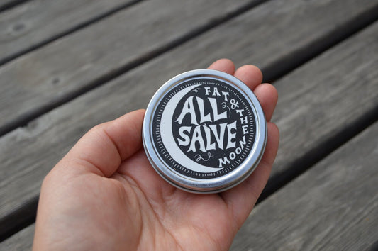 Fat and the Moon - All Salve metal container with lid on showing the brand logo