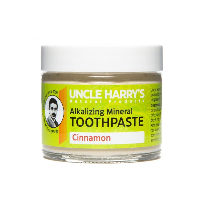 3 Ounce Glass jar with green label showing clay toothpaste