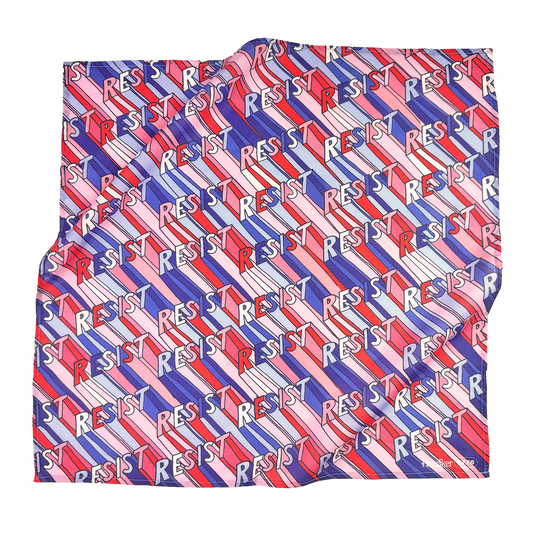 Patterned fabric with 'RESIST' text in red, blue, and white on a white background