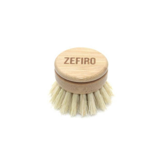 Dishwashing brush with wooden handle and bristle head on a white background, branded 'Zefiro'.