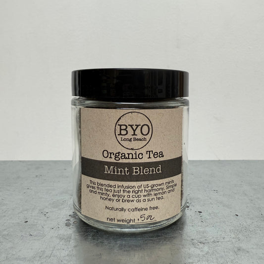 Jar of Organic Tea Mint Blend by BYO on a gray surface with a white background