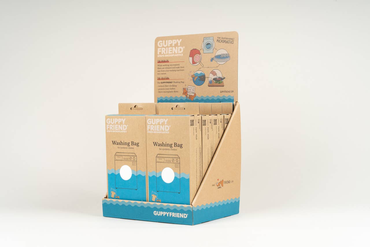 Guppyfriend washing bag packaging on a white background
