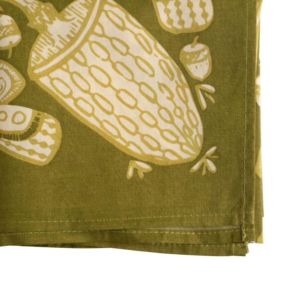 Green fabric with mushroom pattern