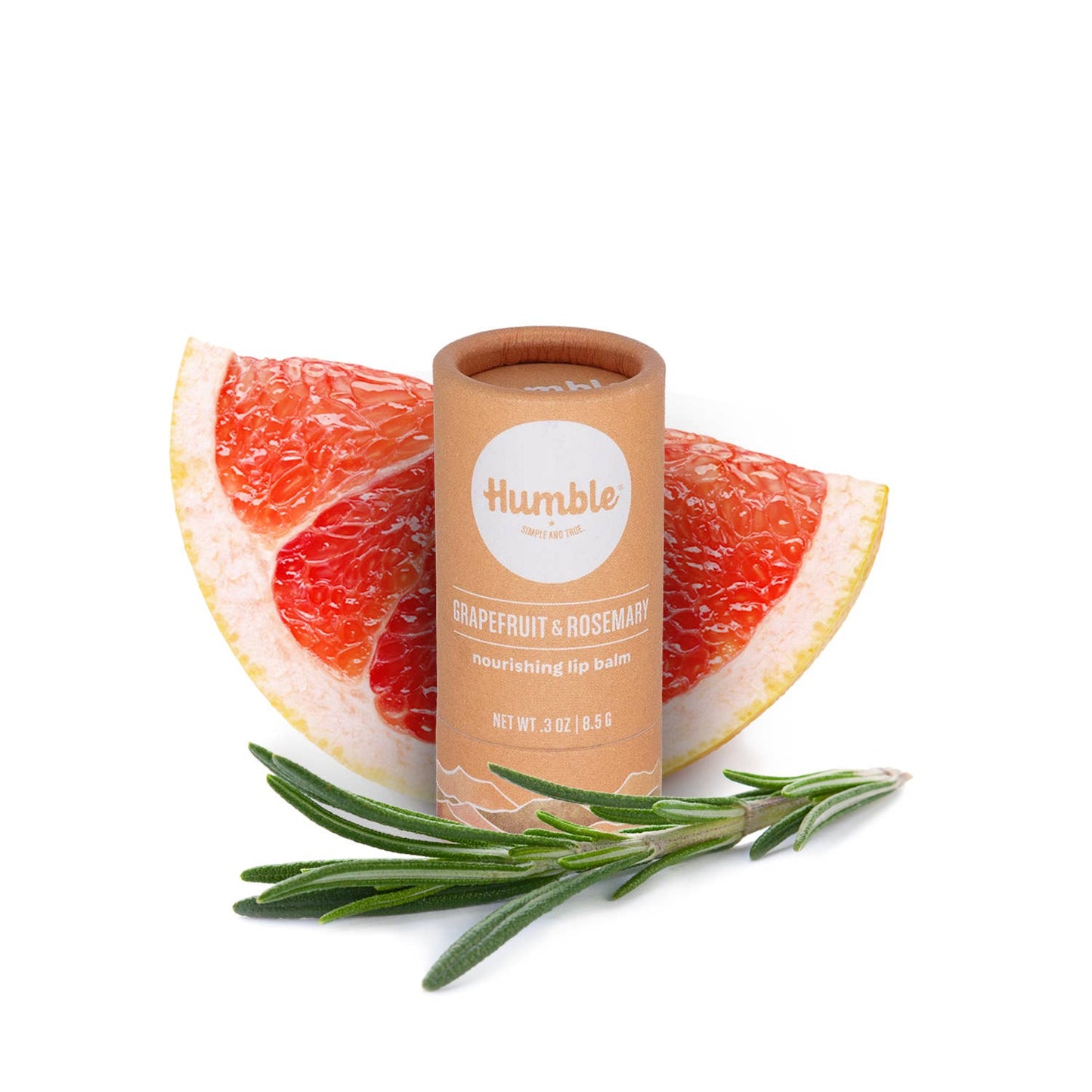 Humble lip balm with grapefruit and rosemary on a white background
