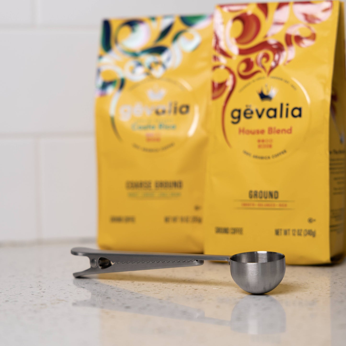 Gevalia coffee package with a metal scoop on a light surface