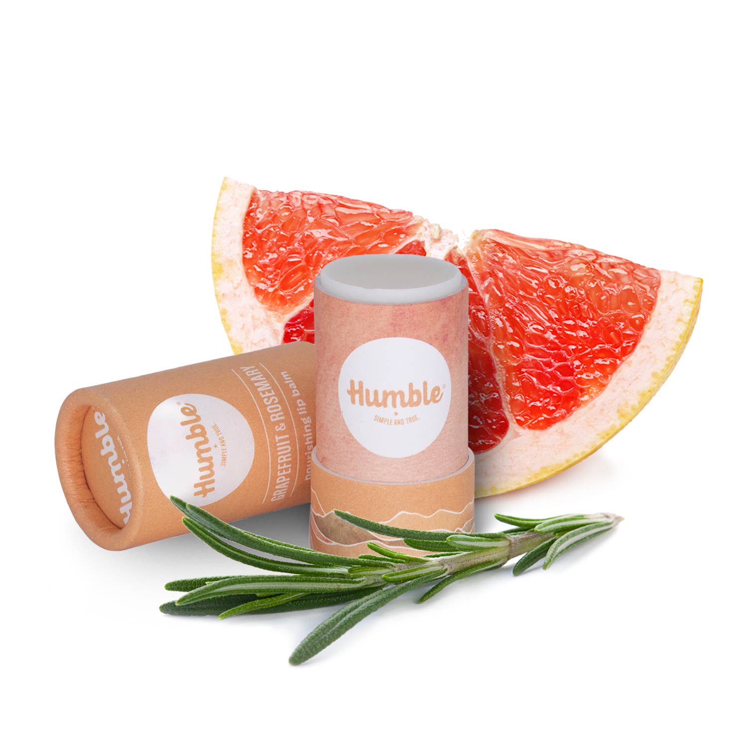 Humble lip balm with grapefruit and rosemary on a white background