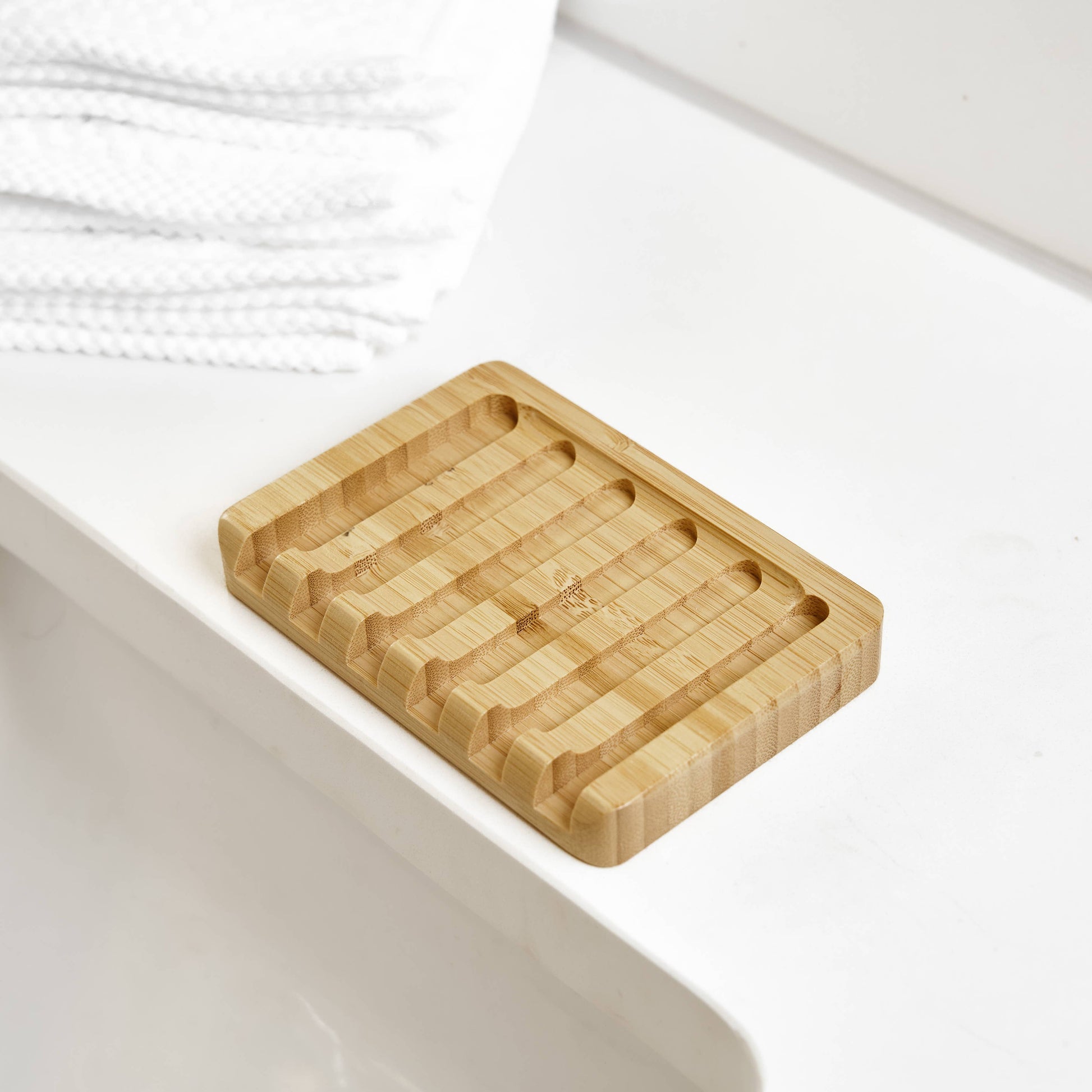 Bamboo soap dish on soap ledge