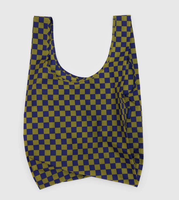 White background with nylon bag laying flat to show dark blue and green checkered pattern