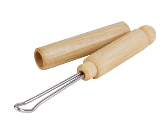 Wood holder with stainless steel curved wand for ear cleaning. Shown with lid off.