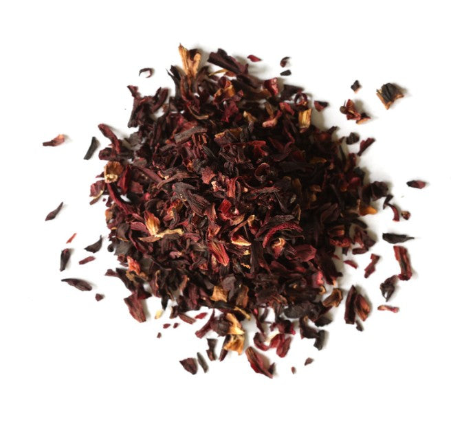 Dried hibiscus flowers on a white background