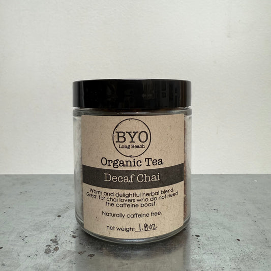 Jar of Organic Tea Decaf Chai by BYO on a gray surface with a white background