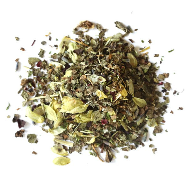 Heap of dried herbs on a white background