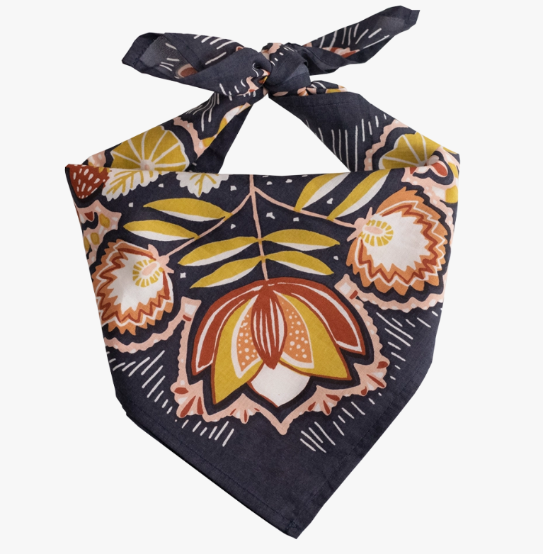 Floral patterned bandana with a knot on a white background