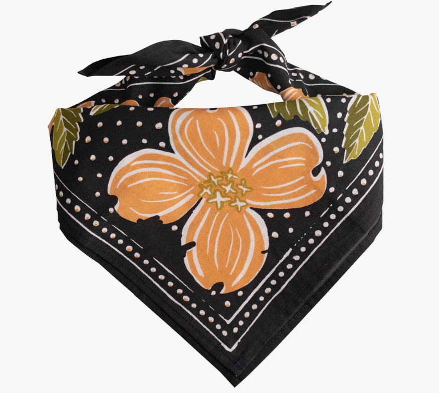 Black bandana with orange floral design on a white background