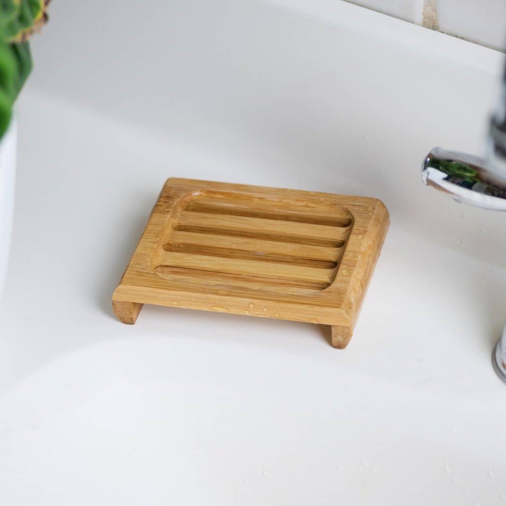 Bamboo soap dish on a white background