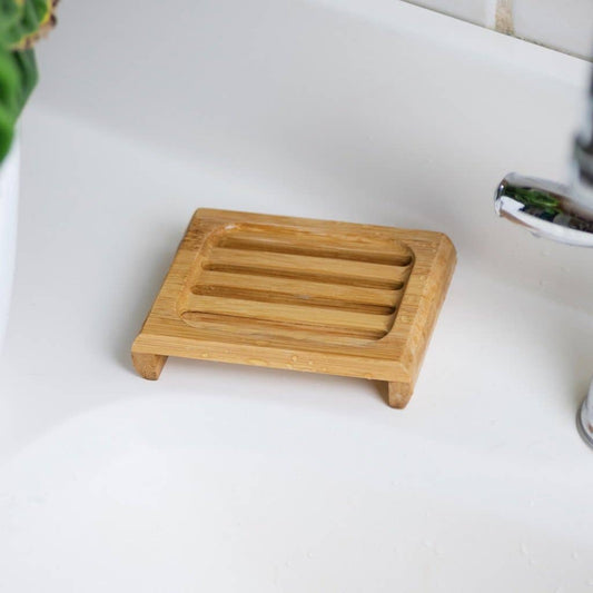 Bamboo soap dish on a white background