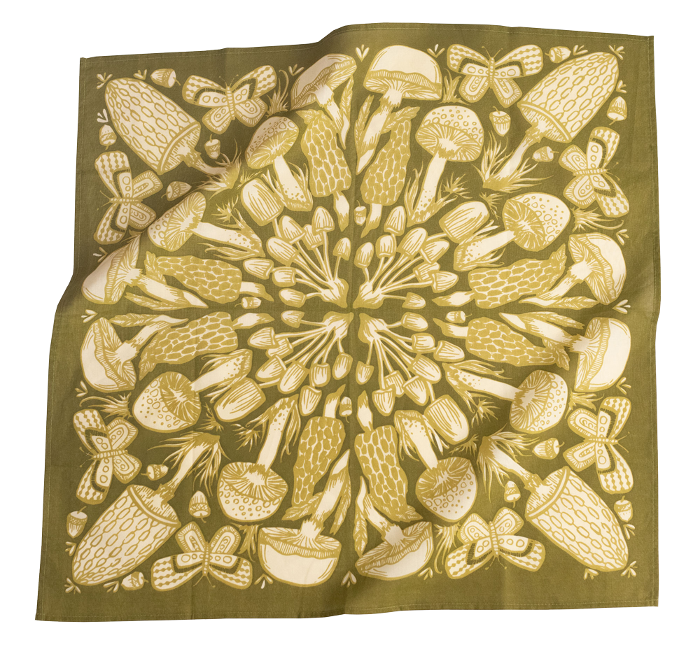 Green fabric square with white mushroom pattern