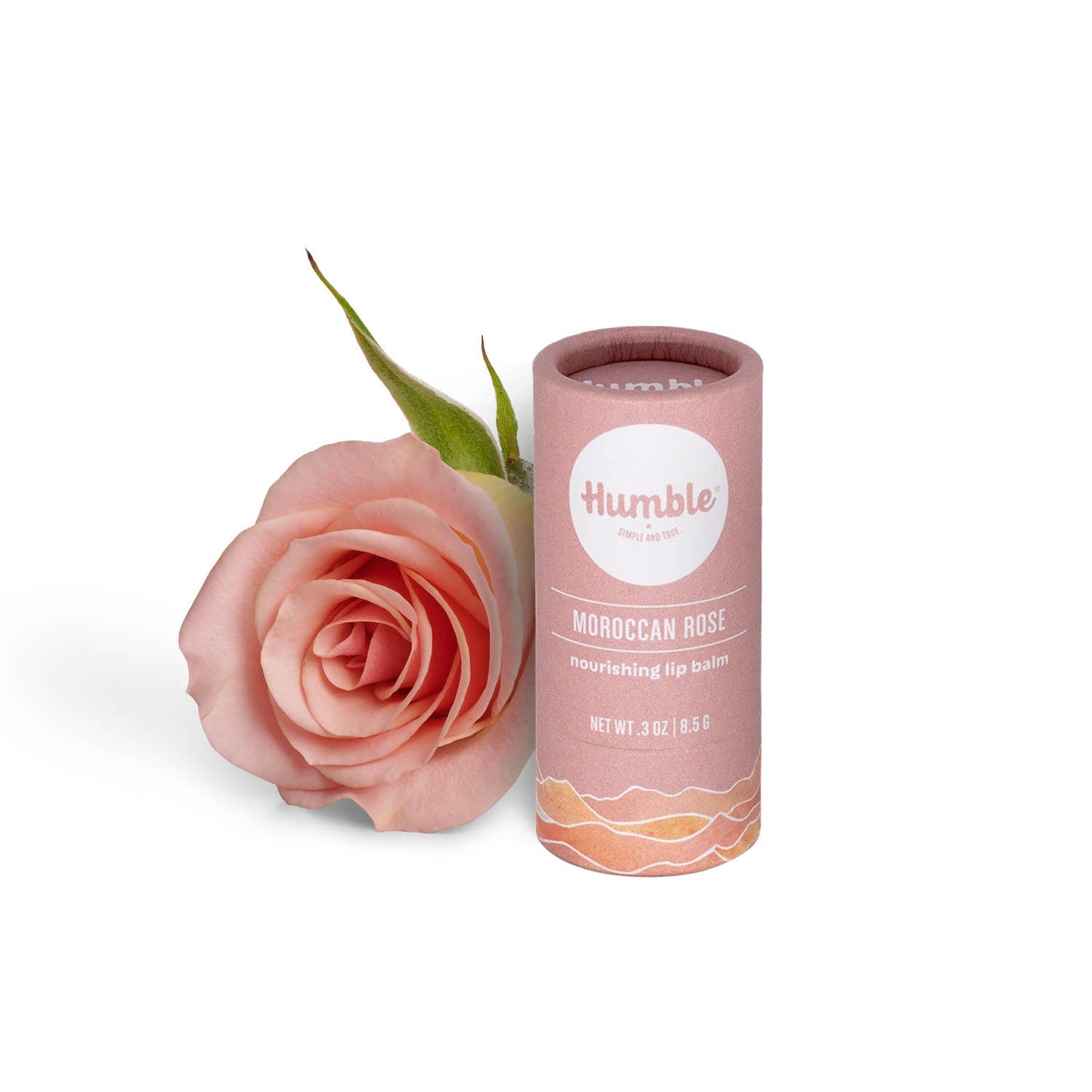 Humble lip balm tube with a pink rose on a white background