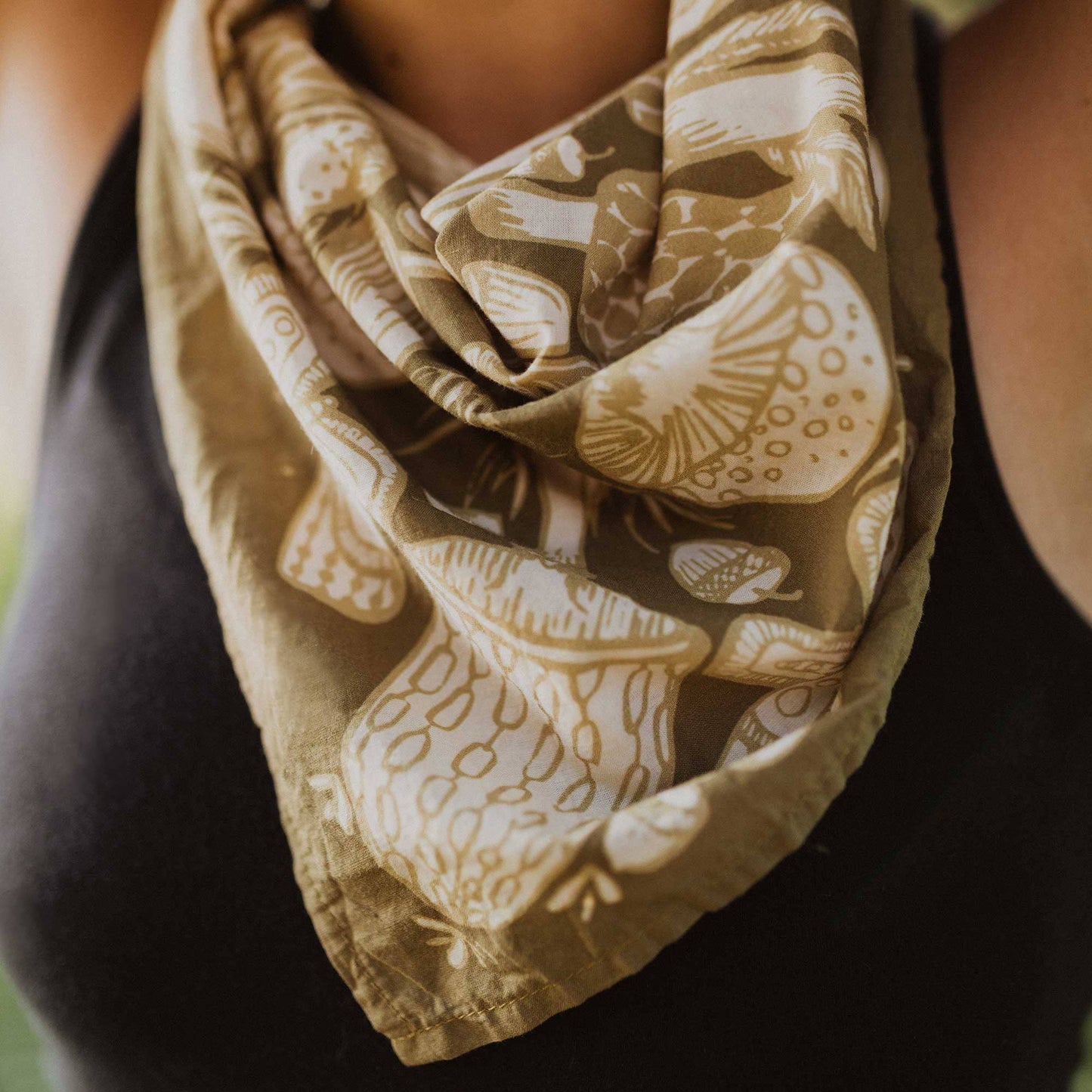 Patterned scarf with mushrooms on a black background